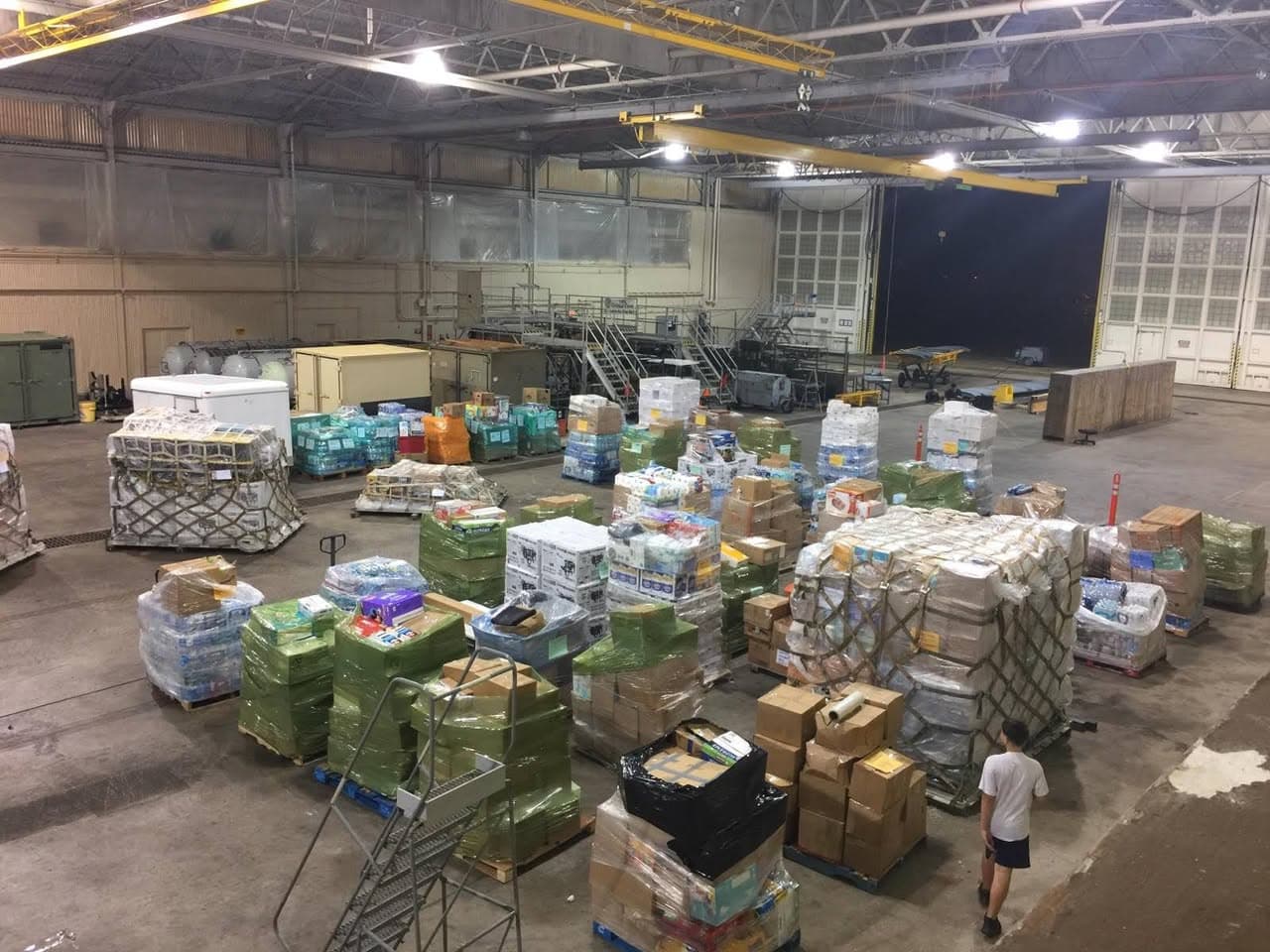 Overhead view of warehouse packed with supply pallets